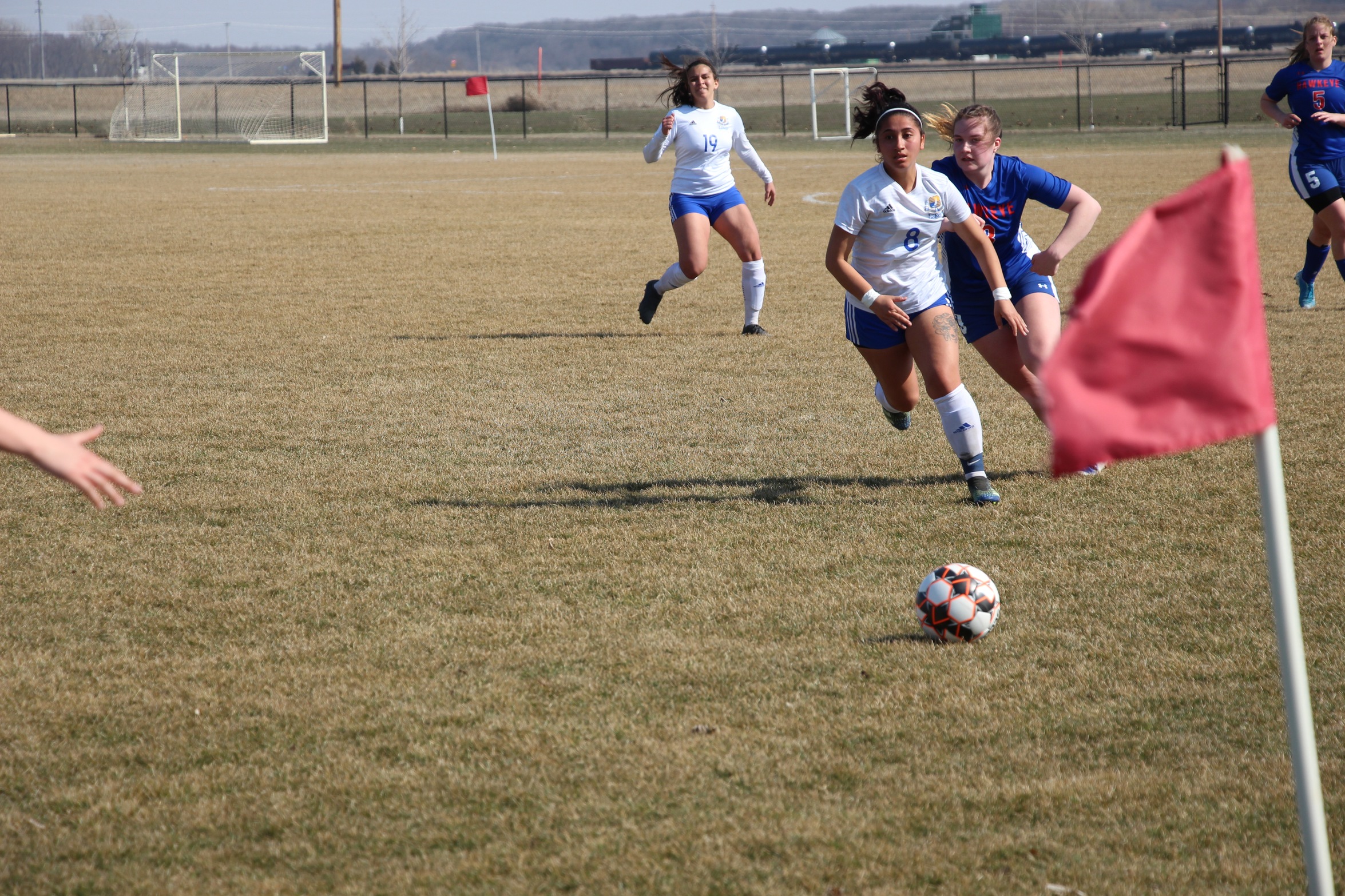 Melissa Fajardo chases down the ball against Hawkeye.